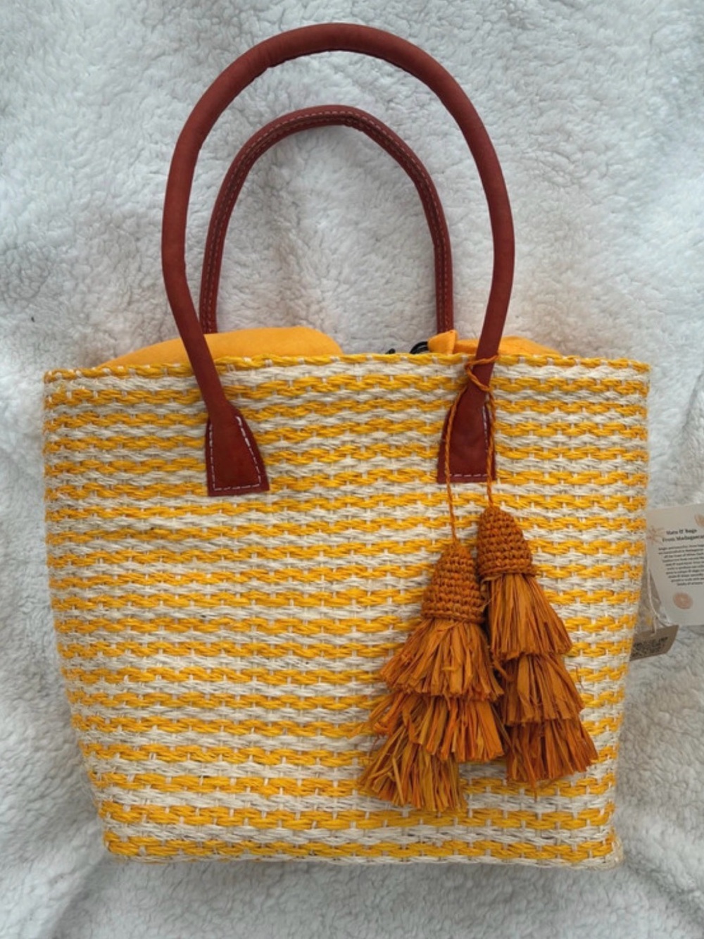 Yellow Woven Tote with Brown Handles and Tassel Detail